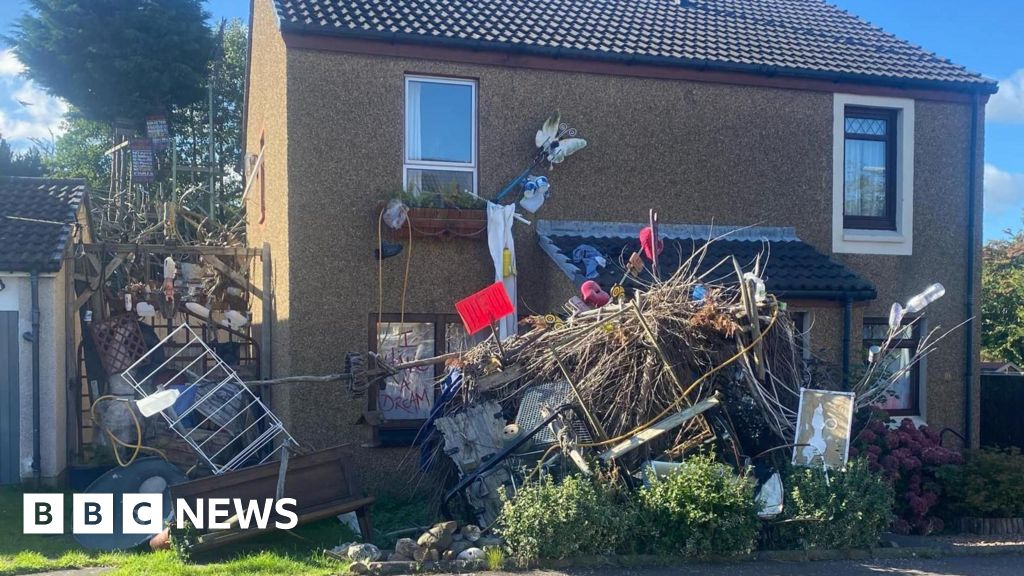 Man defends ‘rubbish’ art after neighbours complain