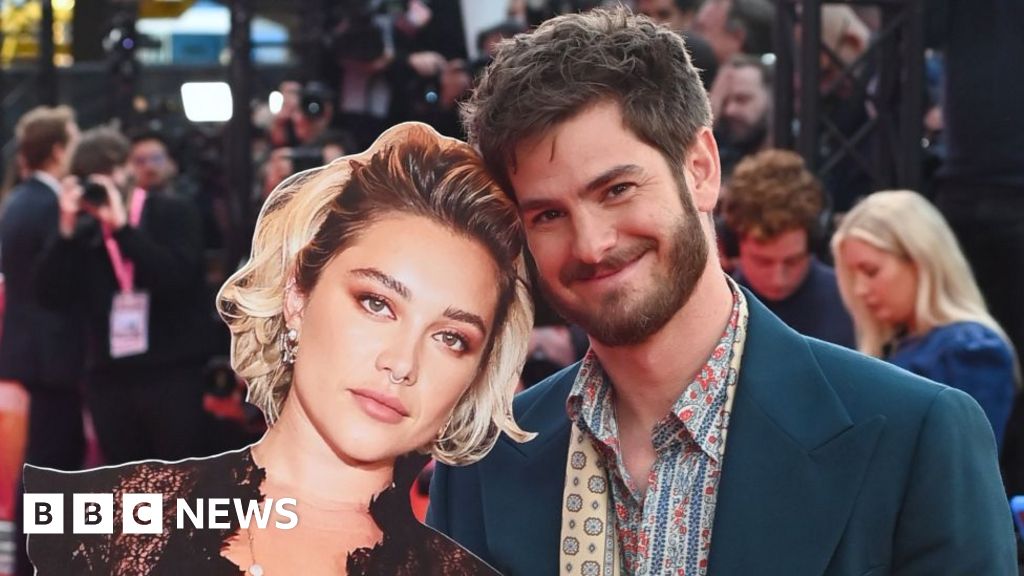 Andrew Garfield takes Florence Pugh cardboard cut-out to premiere